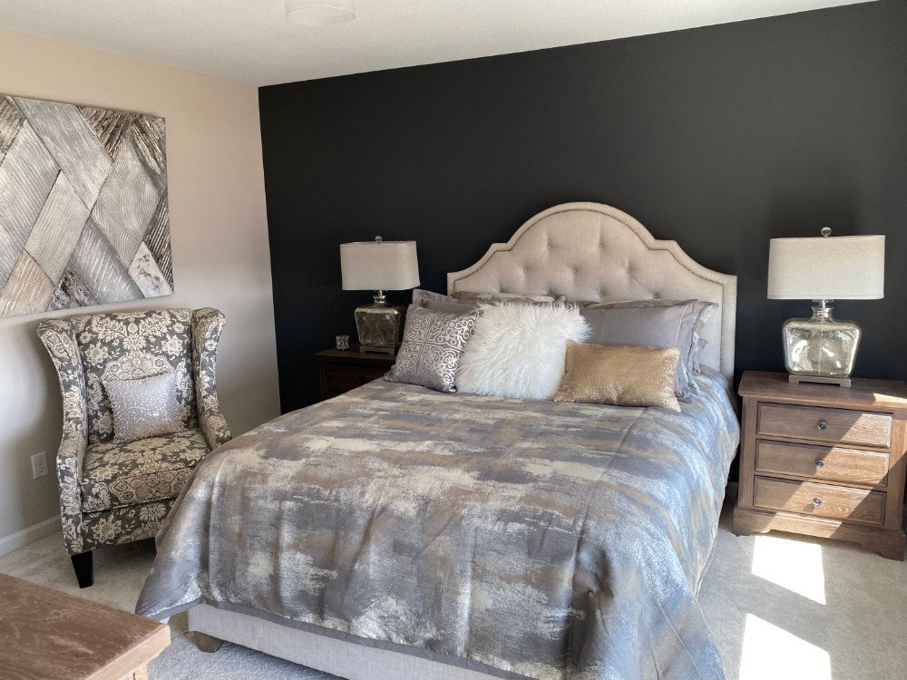 Bedroom with accent wall in SW Iron Ore