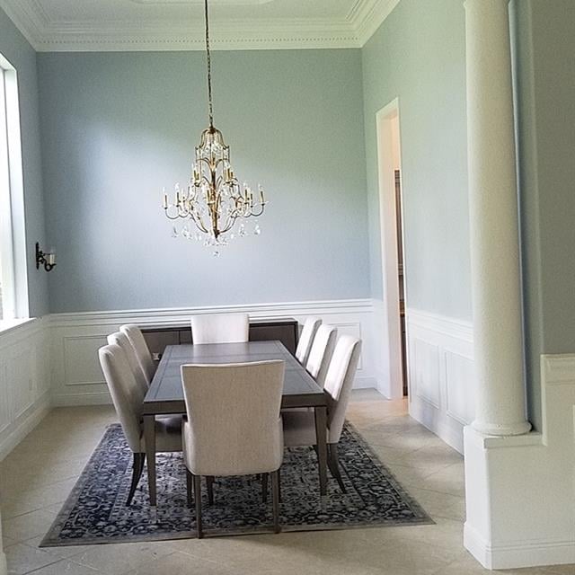 Dining room painted white and light blue
