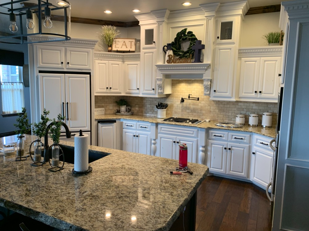 Kitchen cabinet repaint. No color change. Color: Sherwin Williams -  Extra White