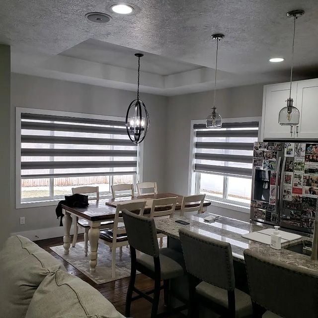 Modern dining room and kitchen with muted colors