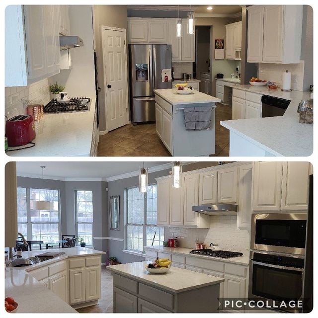 white kitchen with grey walls and white accents