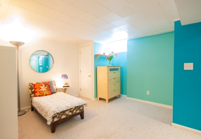 Brightly Lit Basement with Cerulean Walls.