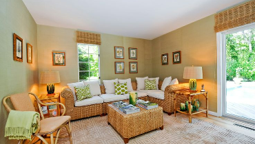 Living room with wicker furniture.