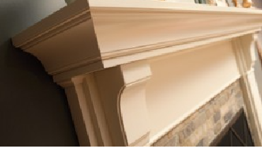 Fireplace mantle with decorations on it