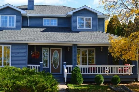 Home Exterior Painted Dark Blue.