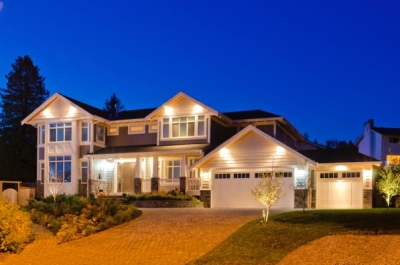 Well-lit house at night.   