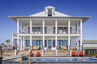 beach front white house paint columns.
