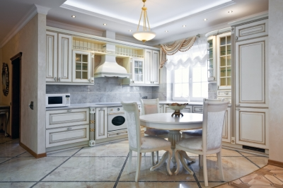 White Kitchen with Colorful Accented Backsplash and Flooring.