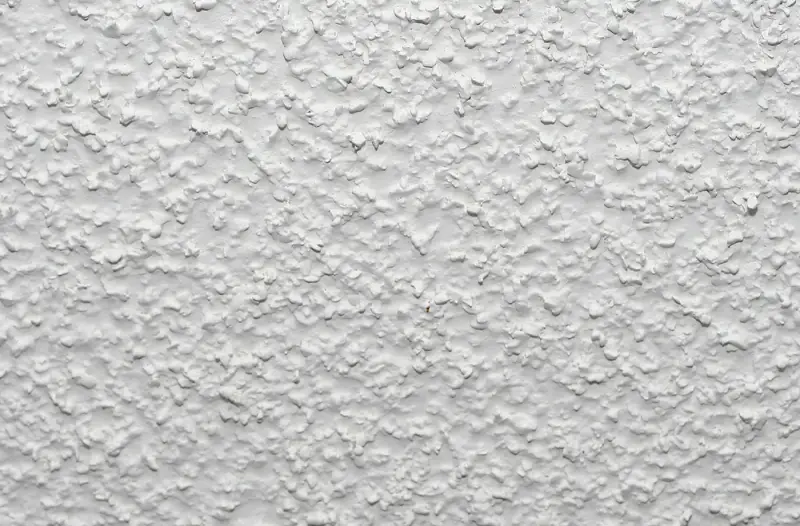Close-up photo of a popcorn ceiling.