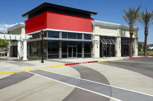 A shopping center painted in red.