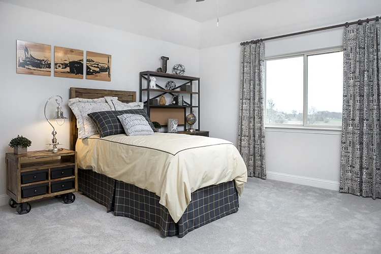 A bedroom after wallpaper removal service from Five Star Painting.